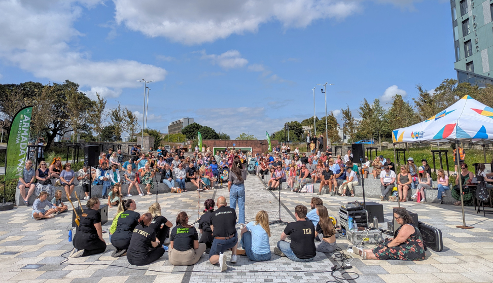 Musician performing in front of crowd